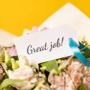 great-job-message-beautiful-floral-bouquet-with-congratulatory-note-pastel-flowers-yellow-background-encouragement-celebration-scaled.jpg